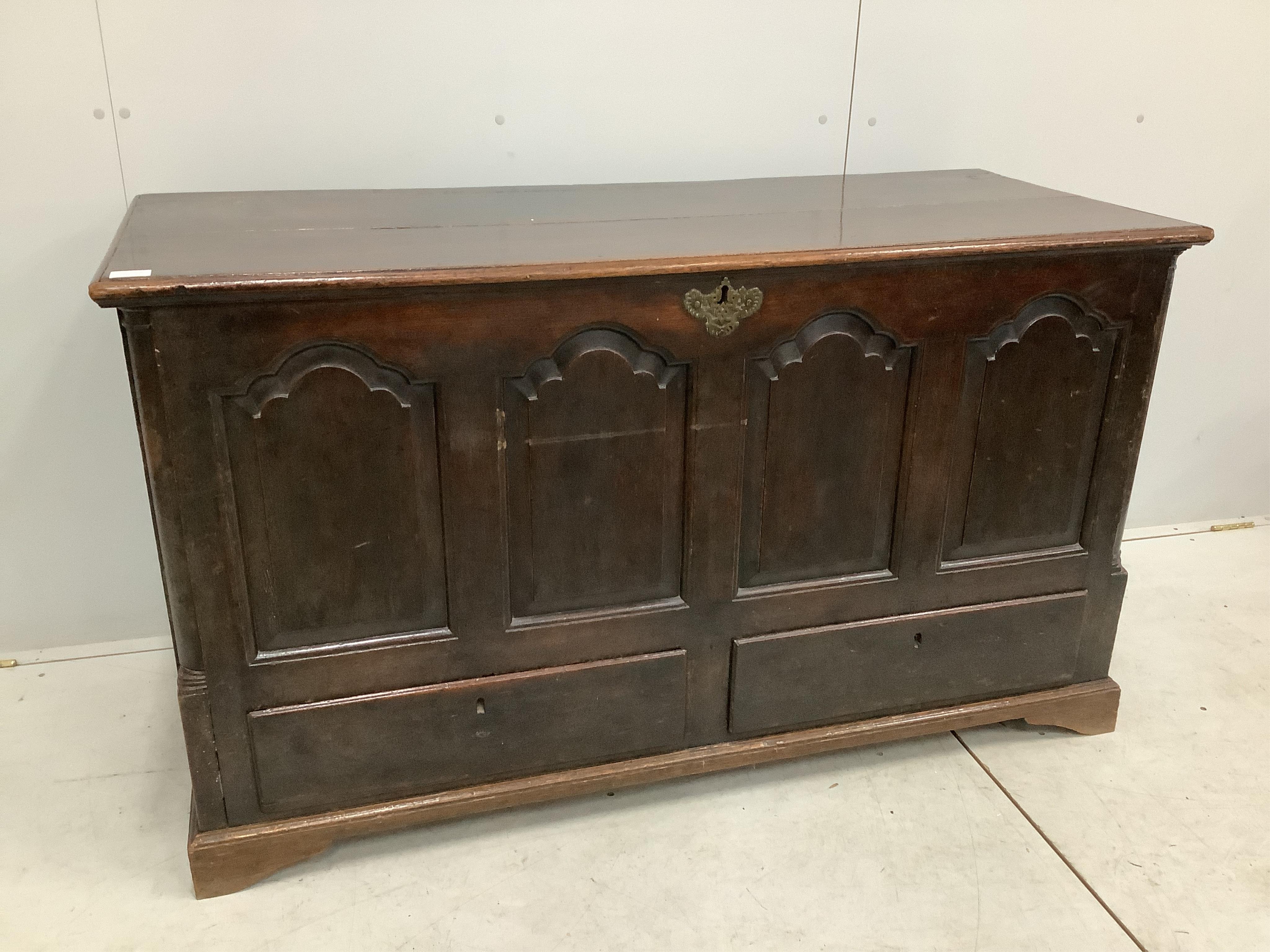 A late 17th / early 18th century panelled oak mule chest, width 141cm, depth 58cm, height 81cm. Condition - fair